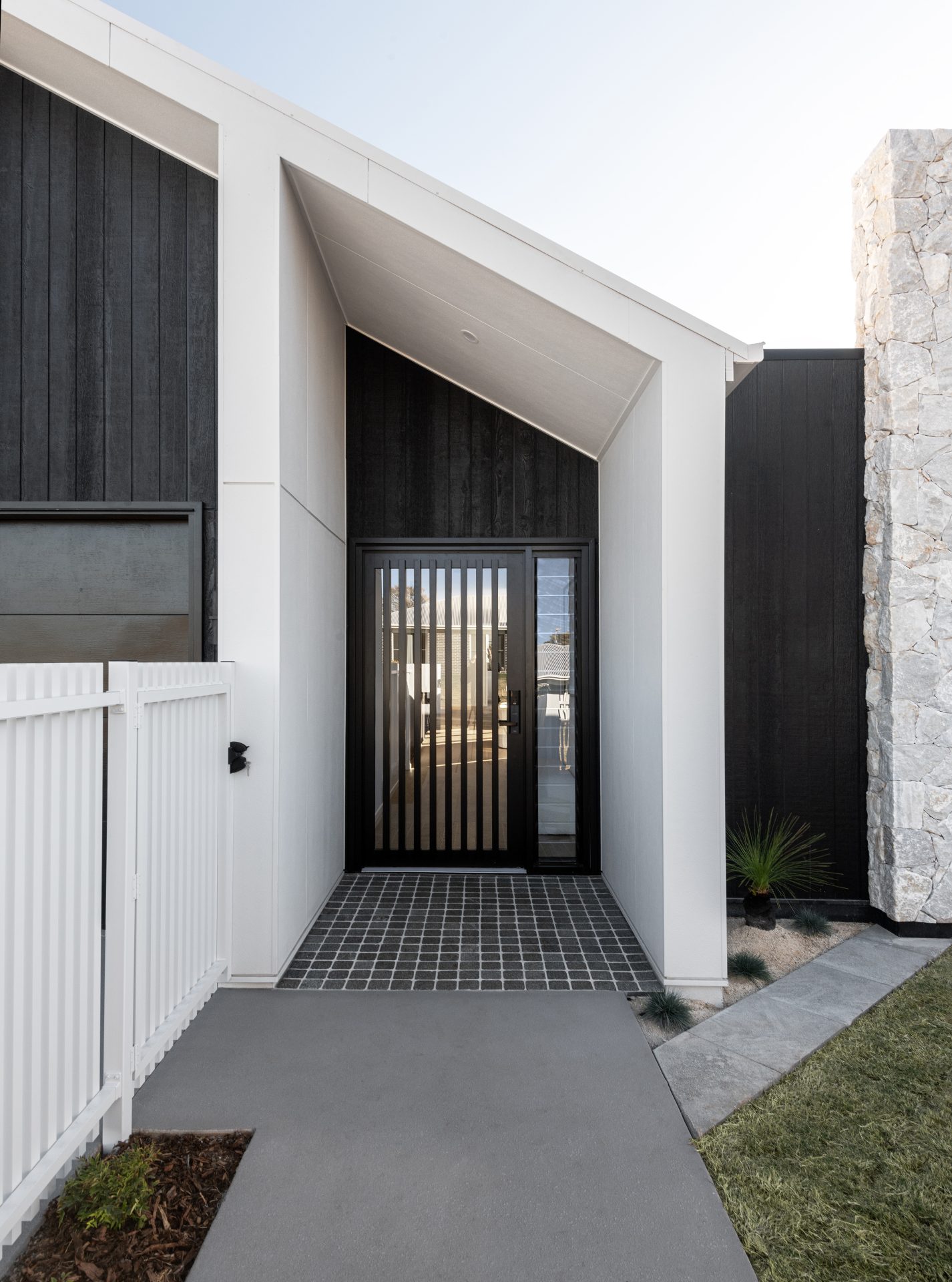 Weathertex front door of a newly built white house in Melbourne