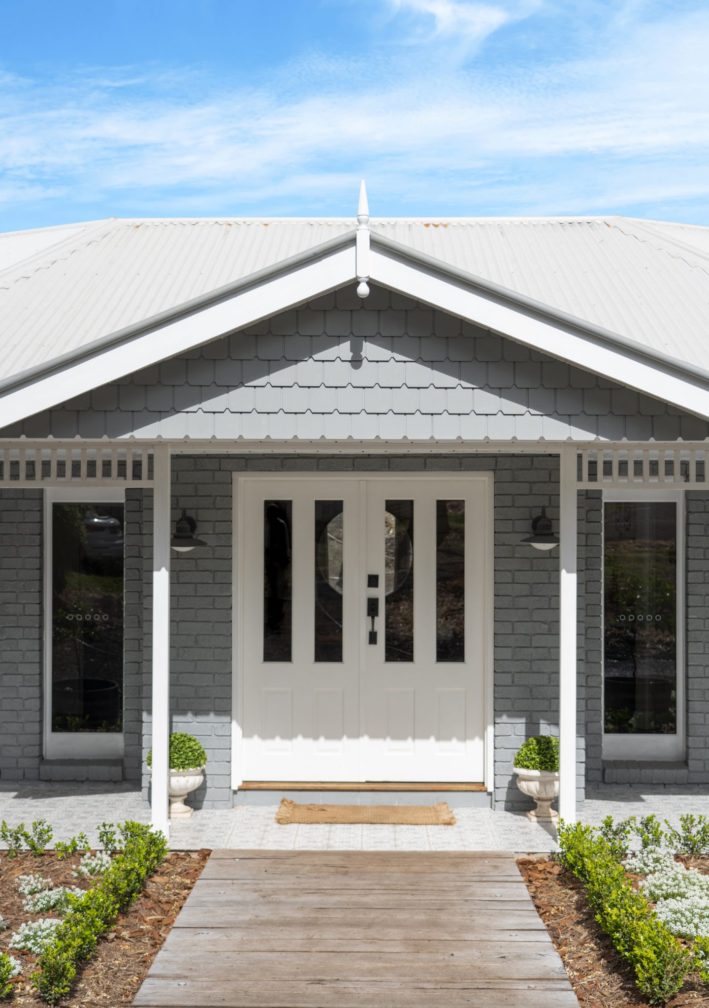 Weathertex shingles on the front of a grey house in Australia